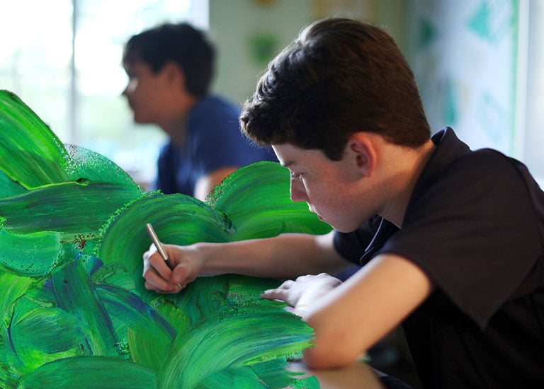 photo of child drawing