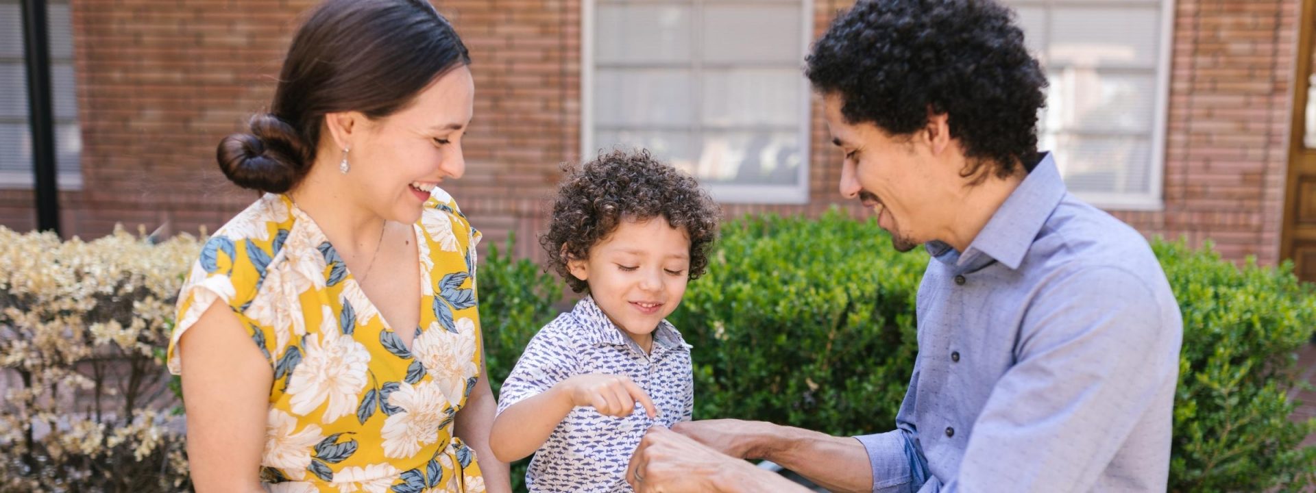 parents playing with toddler